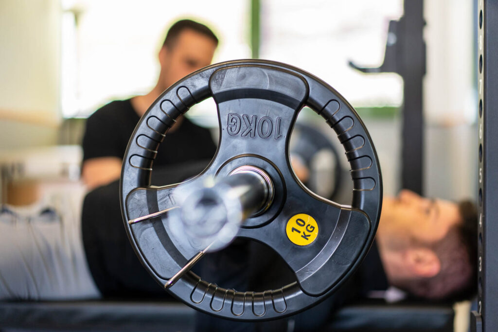 Allenamento bilanciere con personal trainer